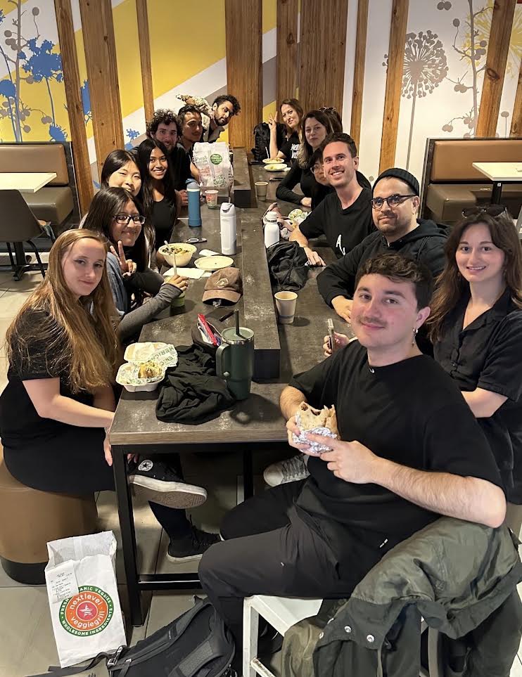 Members sharing a meal together at Veggie Grill